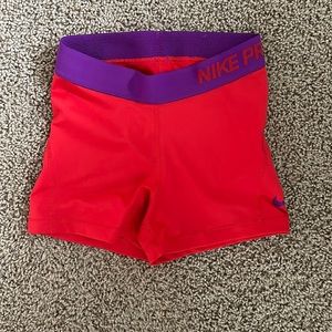 Nike pros, red spandex, athletic